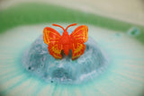 Bruisbal vlinder met verrassing